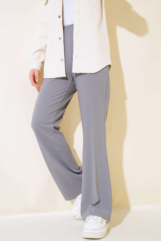 Spanish-style flared double-leg trousers with elasticated waistband, grey.