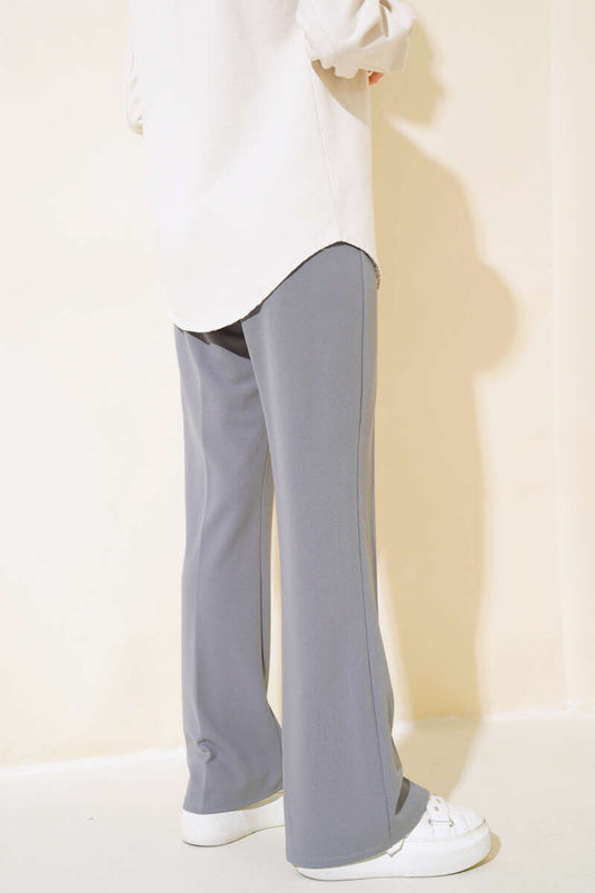 Spanish-style flared double-leg trousers with elasticated waistband, grey.