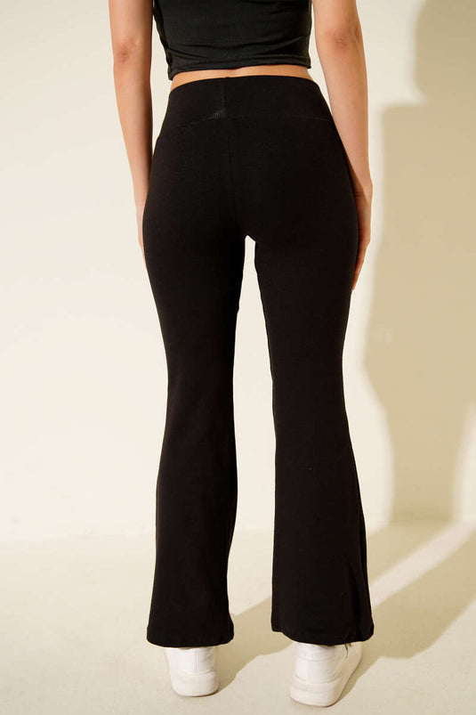 Black Spanish-style flared trousers