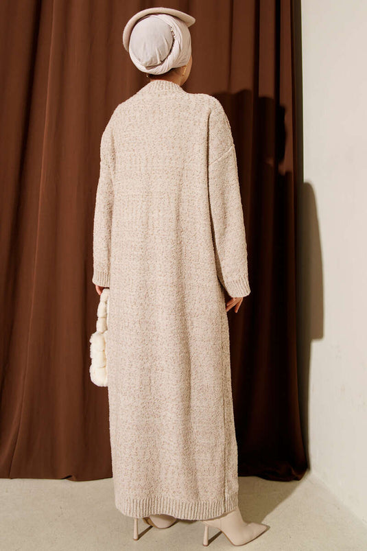 Robe en maille beige à motif en relief