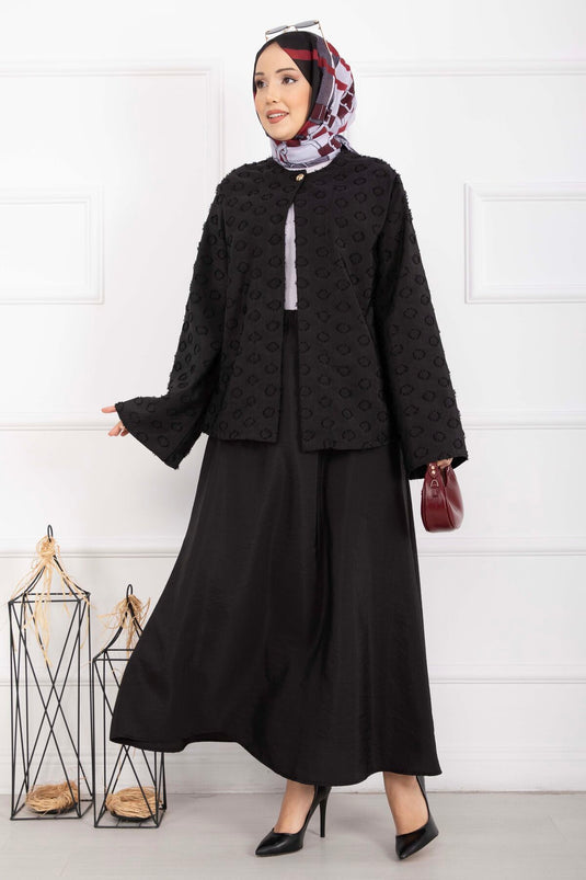 طقم تنورة بحزام بارز الملمس باللون الأسود