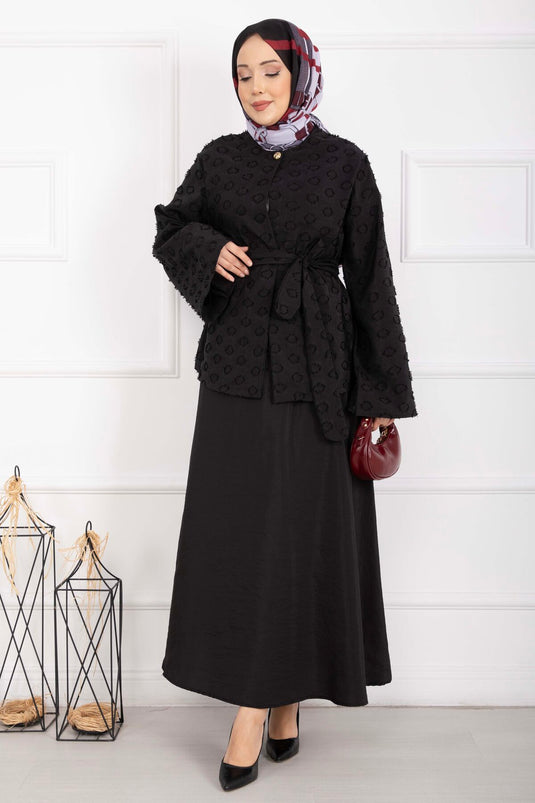 طقم تنورة بحزام بارز الملمس باللون الأسود