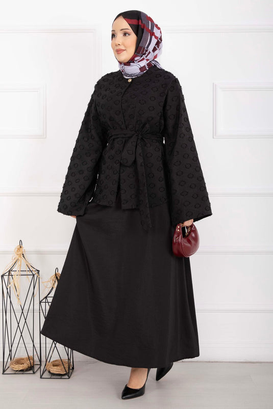 طقم تنورة بحزام بارز الملمس باللون الأسود