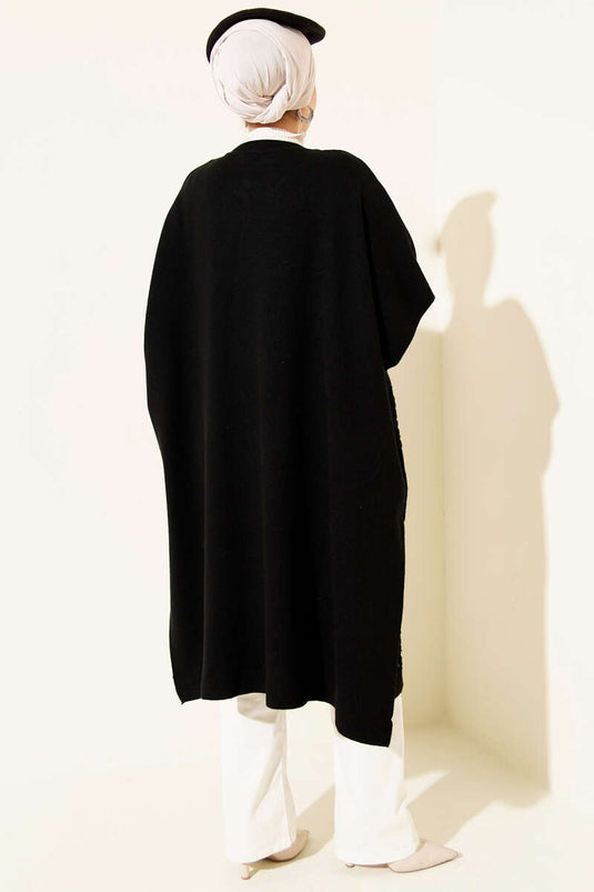 بونشو أسود مزين باللؤلؤ المنقوش