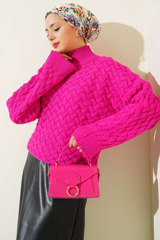 كنزة صوفية بأكمام خفاشية بارزة اللون الفوشيا
