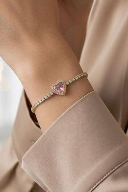 سوار ذهبي مزين بحجر ماء على شكل قلب