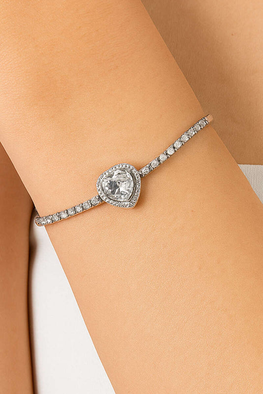 Hartvormige zilveren armband met waterstenen