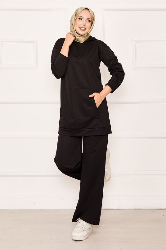 Combinaison deux pièces noire avec poche kangourou et capuche