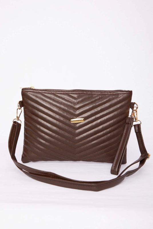 Pochette matelassée à fermeture éclair motif marron