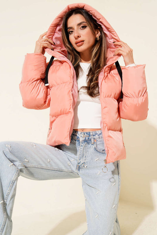 Korte gewatteerde jas met capuchon, poederroze