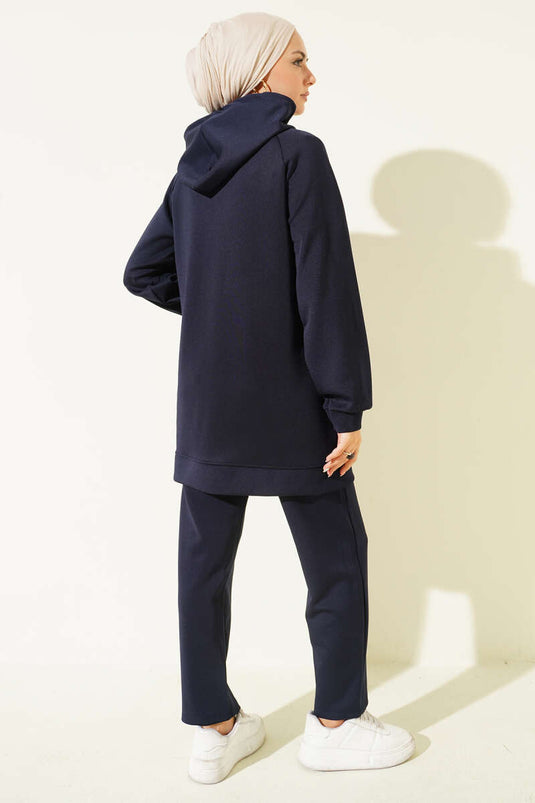 Combinaison deux pièces bleu marine à capuche et poches, imprimé léopard, en néoprène, bleu marine