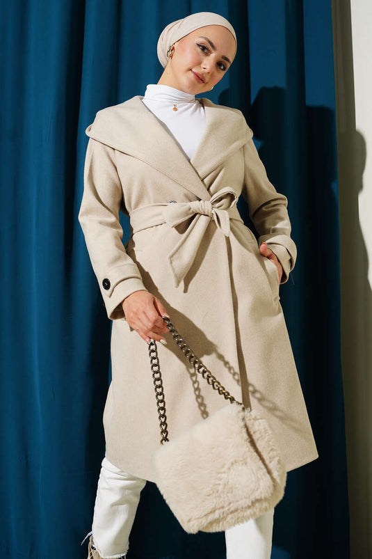 Manteau en cachemire beige à capuche et boutons