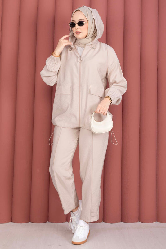 Ensemble décontracté deux pièces beige avec capuche et fermeture éclair