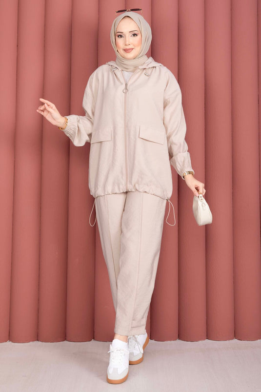 Ensemble décontracté deux pièces beige avec capuche et fermeture éclair