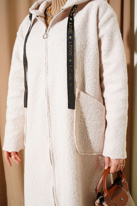 Manteau bouclé à capuche et fermeture éclair, beige