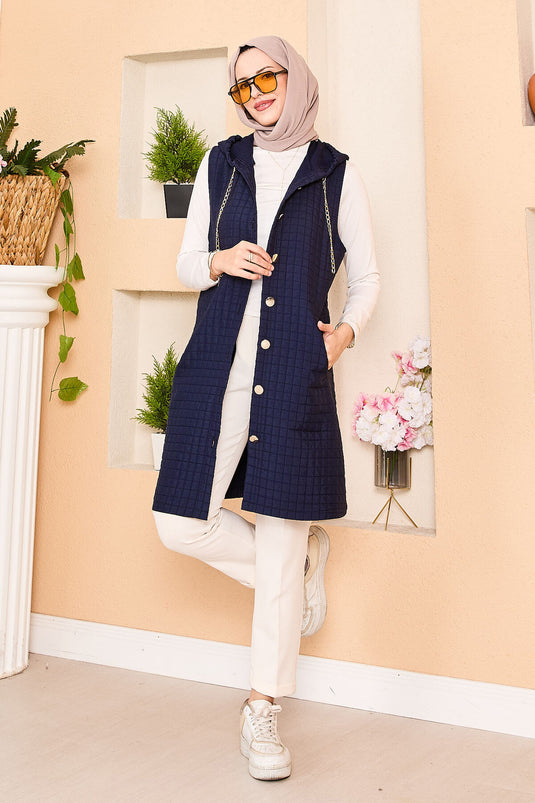 Gilet matelassé à capuche et boutons dorés bleu marine