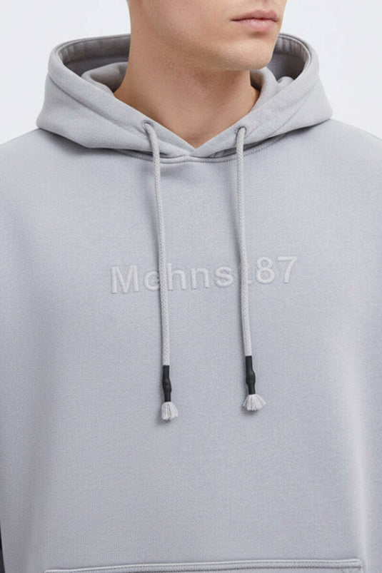 سويت شيرت رجالي واسع برقعة مطرزة مع غطاء رأس رمادي