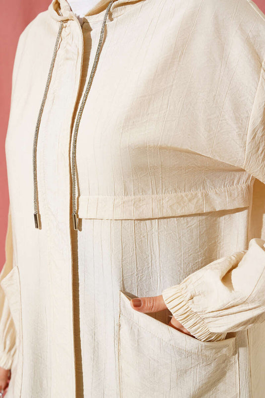 قبعة بغطاء للرأس مع جيب أمامي باللون البيج