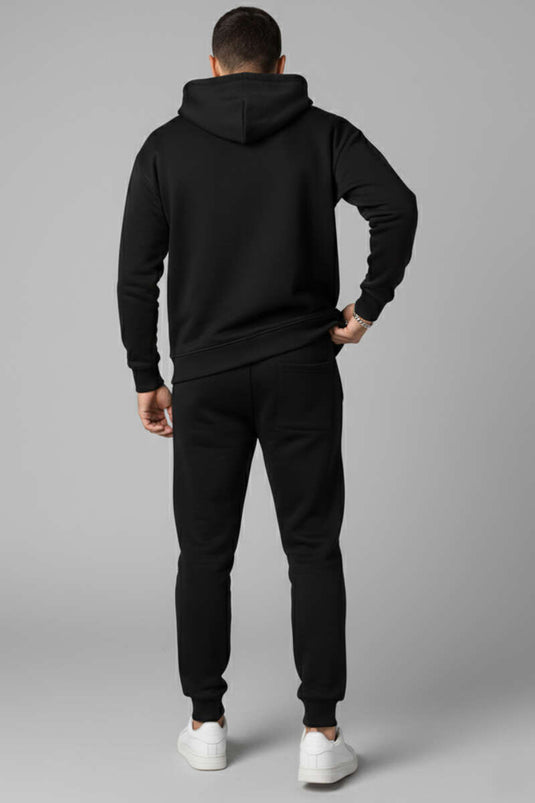 طقم بدلة رياضية بسحاب مع قبعة وأساور عند الكاحل باللون الأسود