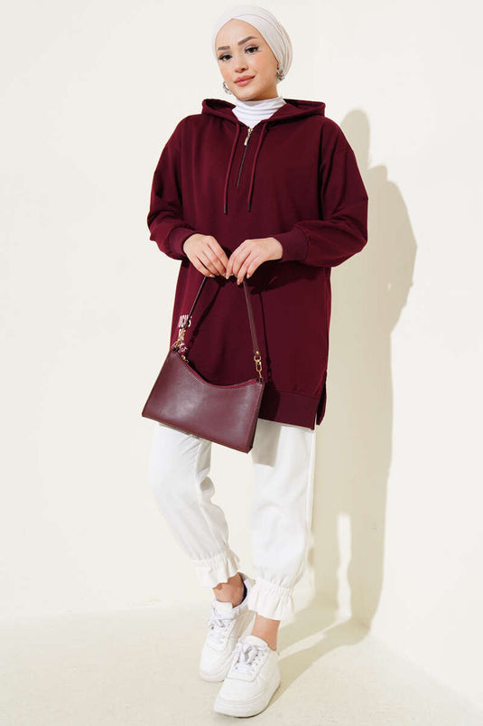 Tunique imprimée bordeaux à demi-fermeture éclair avec capuche