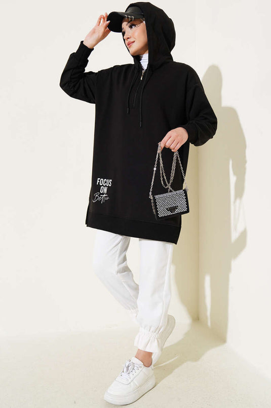 Tunique imprimée noire à demi-fermeture éclair avec capuche