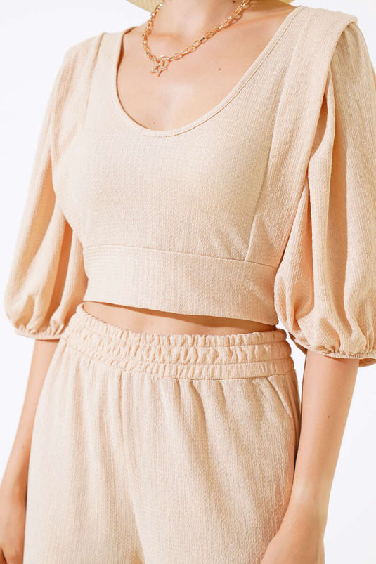 Ensemble deux pièces beige à manches pastèque