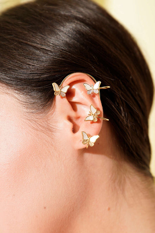 Orecchino a cartilagine con pietra preziosa a forma di farfalla, oro.