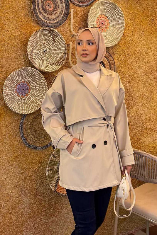 Trench-coat haut de gamme détaillé avec épaulettes ceinturées, couleur pierre