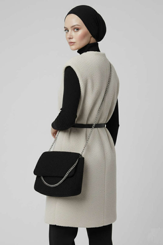 Gilet en peluche ceinturé en écru