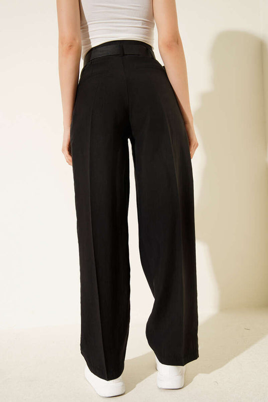 بنطلون قلم رصاص بحزام أسود