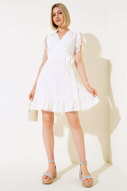 Robe écrue à motif floral ton sur ton