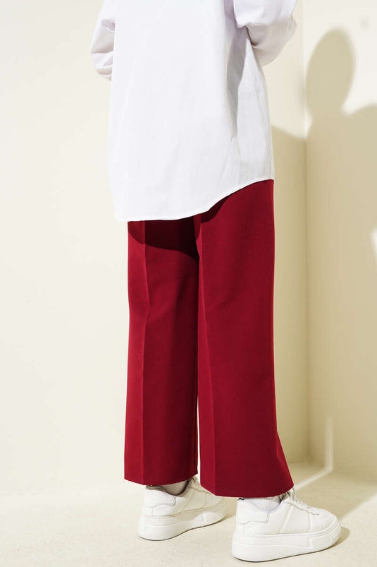 Pantalon double ceinturé rouge bordeaux