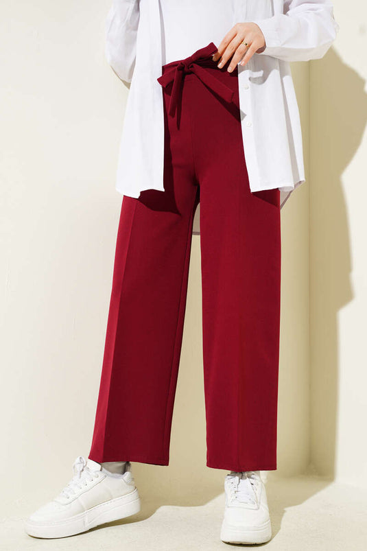 Pantalon double ceinturé rouge bordeaux