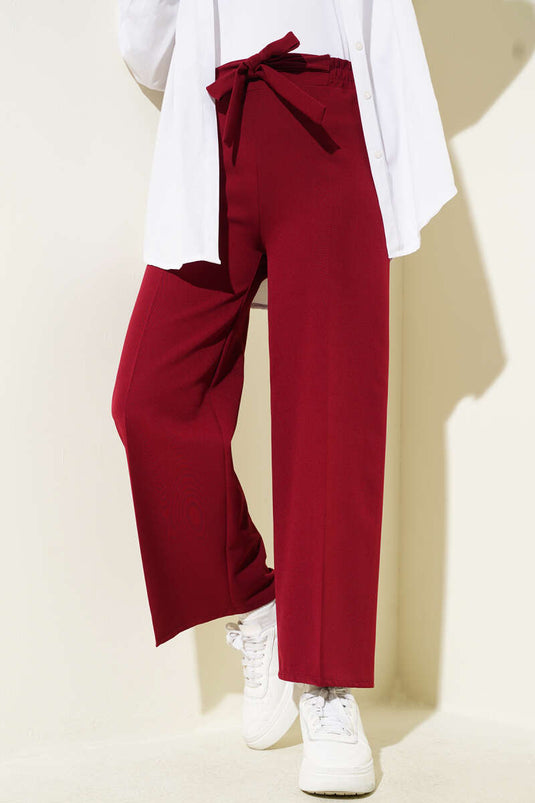 Pantalon double ceinturé rouge bordeaux