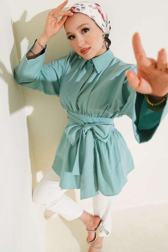Self-belted, front-gathered tunic in mint color.