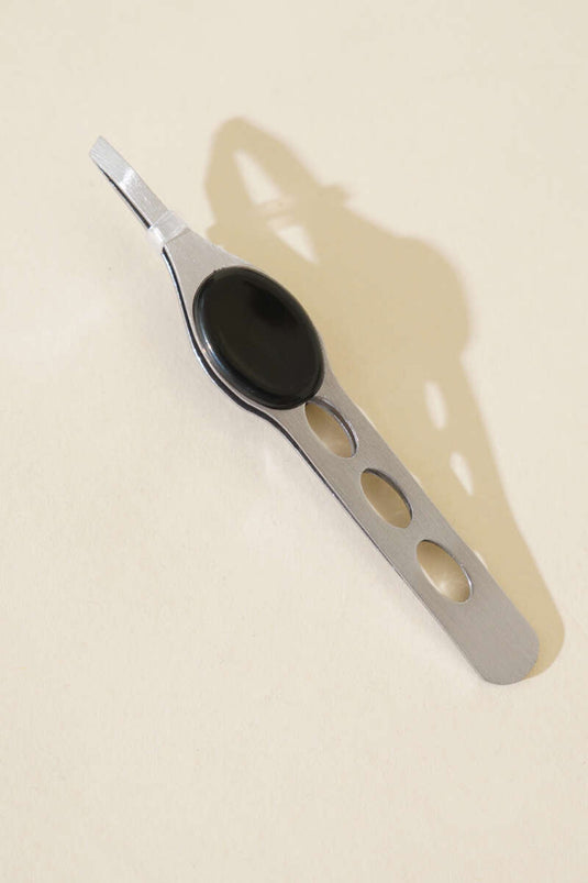 Pince à épiler professionnelle argentée à pointes acérées en platine