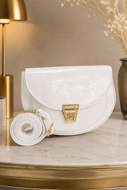 Sac ovale en cuir verni avec détail de fermeture blanc