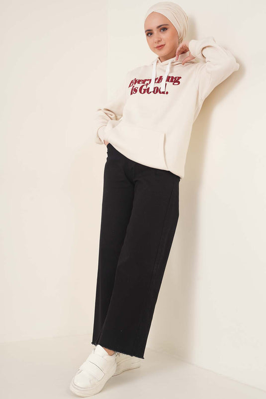 Kurze Jeanshose mit Quasten in Schwarz