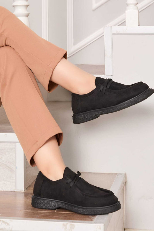 Chaussures à lacets style mocassins classiques noires