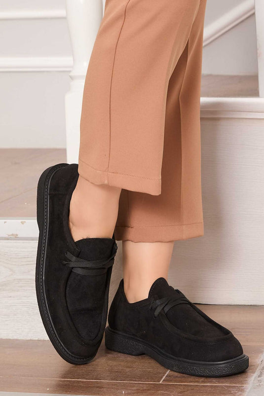 Chaussures à lacets style mocassins classiques noires