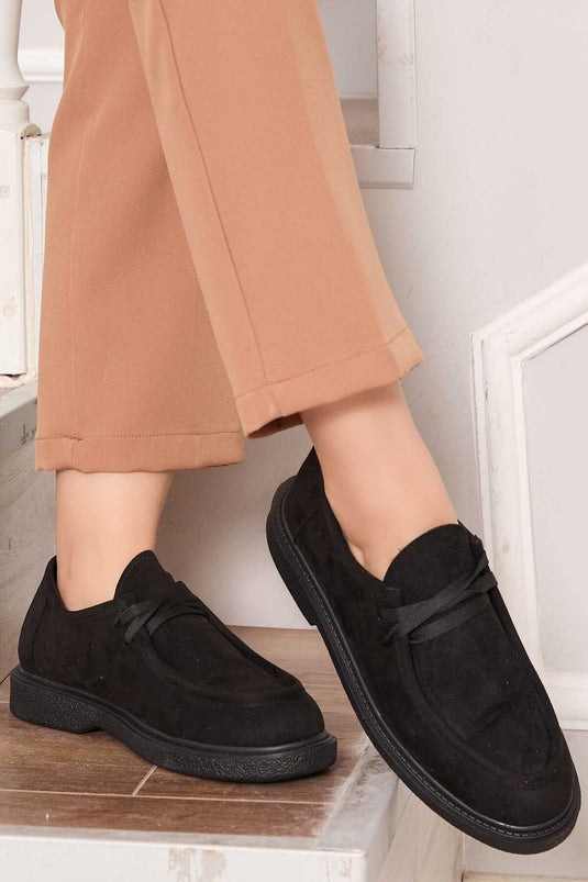 Chaussures à lacets style mocassins classiques noires