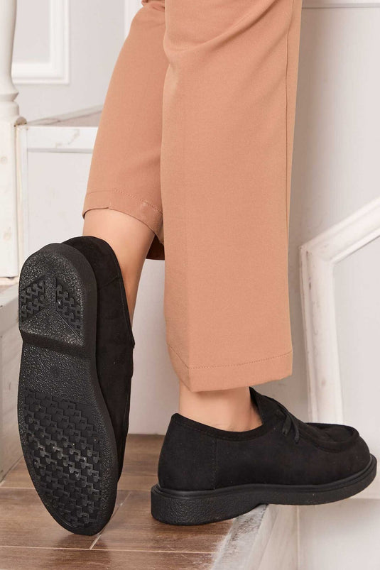 Chaussures à lacets style mocassins classiques noires