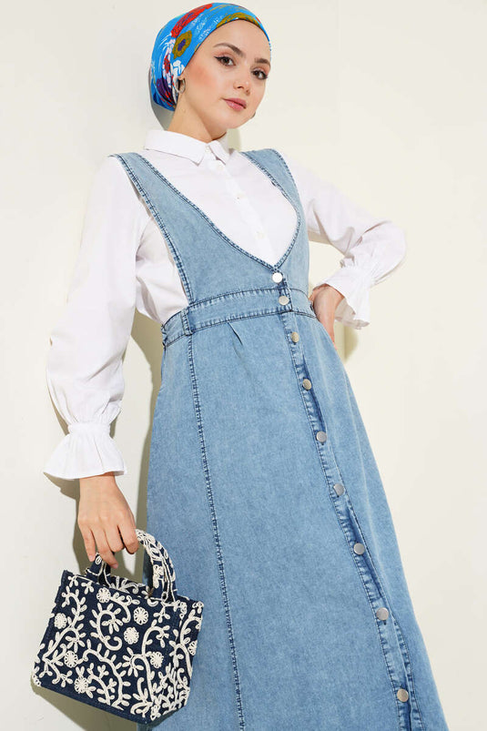 Gilet élastique à taille évasée et jean ouvert