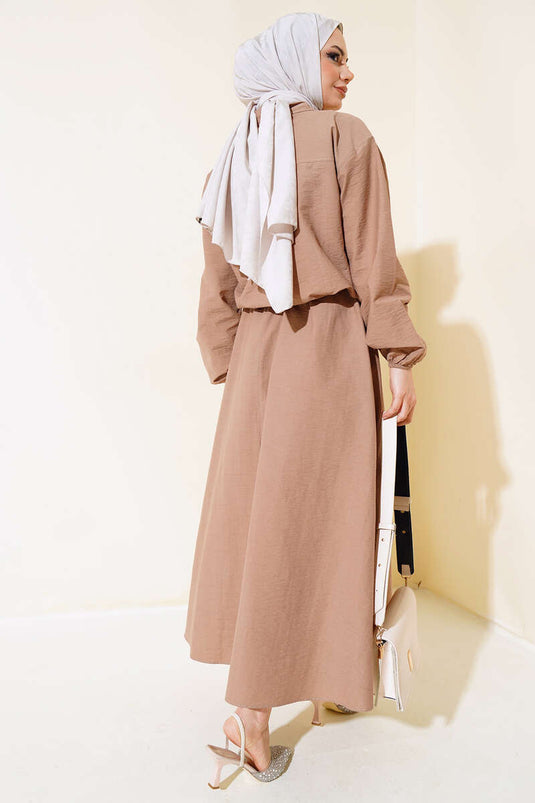 Tailleur jupe en vison avec poignets élastiques