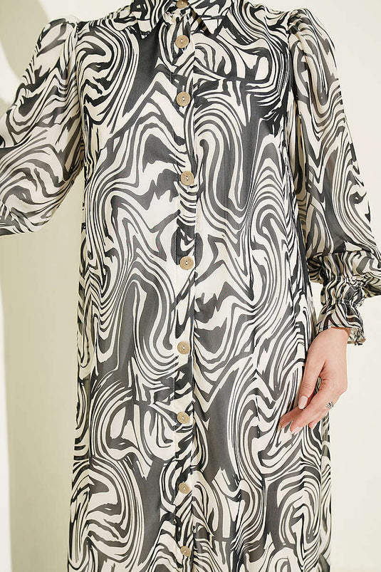 Schwarzes Chiffon-Kleid Mit Muster Und Rüschenkragen