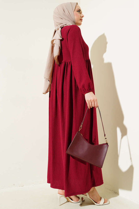 Robe en crêpe bordeaux à manches élastiques