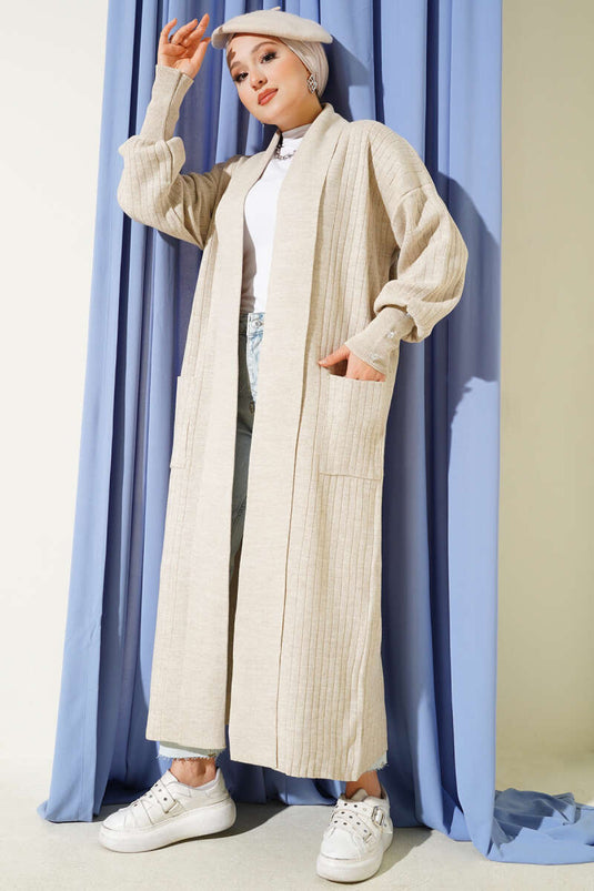 Cardigan en maille à col châle et manches boutonnées, beige