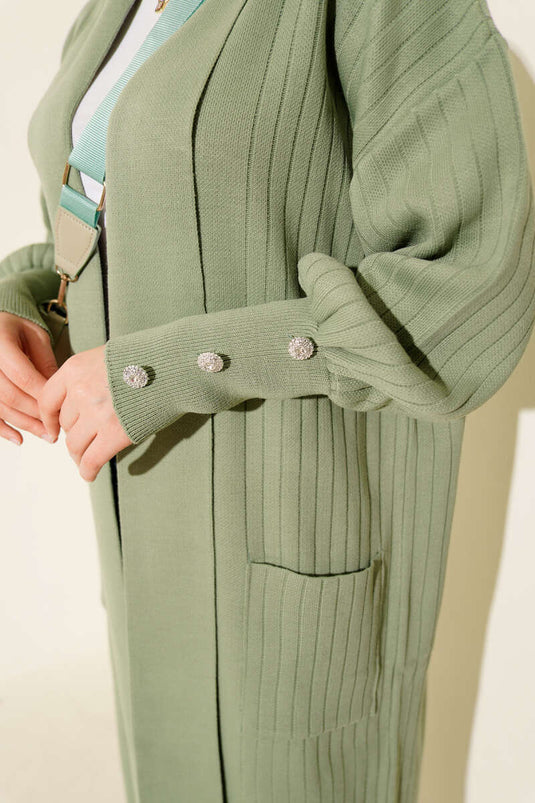 Cardigan lavorato a maglia con collo a scialle e maniche abbottonate, verde mandorla