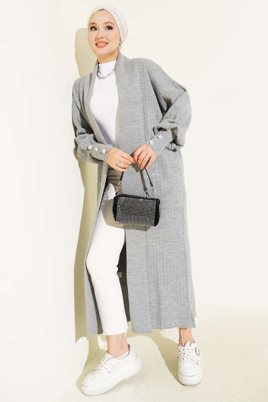 Cardigan tricoté à col châle et manches boutonnées en gris