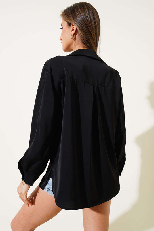 Chemise en mousseline noire à manches fendues